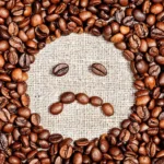 coffee beans sad smile